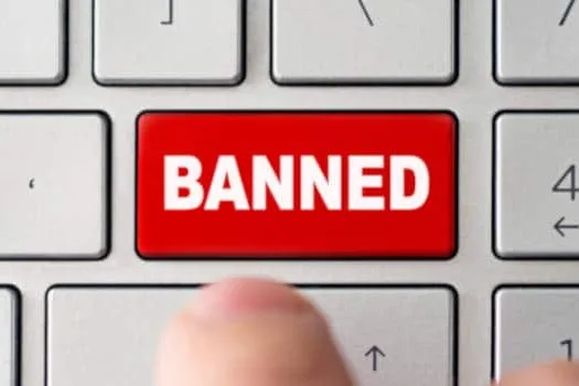 Tecla de teclado que representa el bloqueo de sitios de juego ilegal en internet
